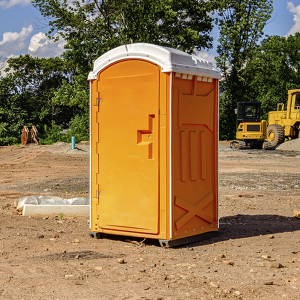 how often are the porta potties cleaned and serviced during a rental period in Harvey County